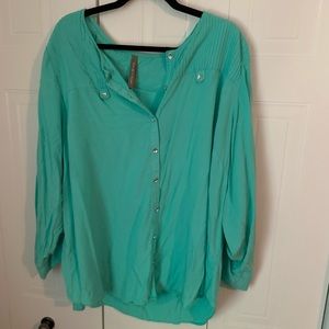 Plus size teal blouse with silver buttons and details